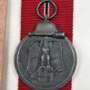 German Eastern Front Medal “Ostmedaille” w/ Original Packet – (Arbeitsgemeinschaft Metall & Kunststoff) - Image 2